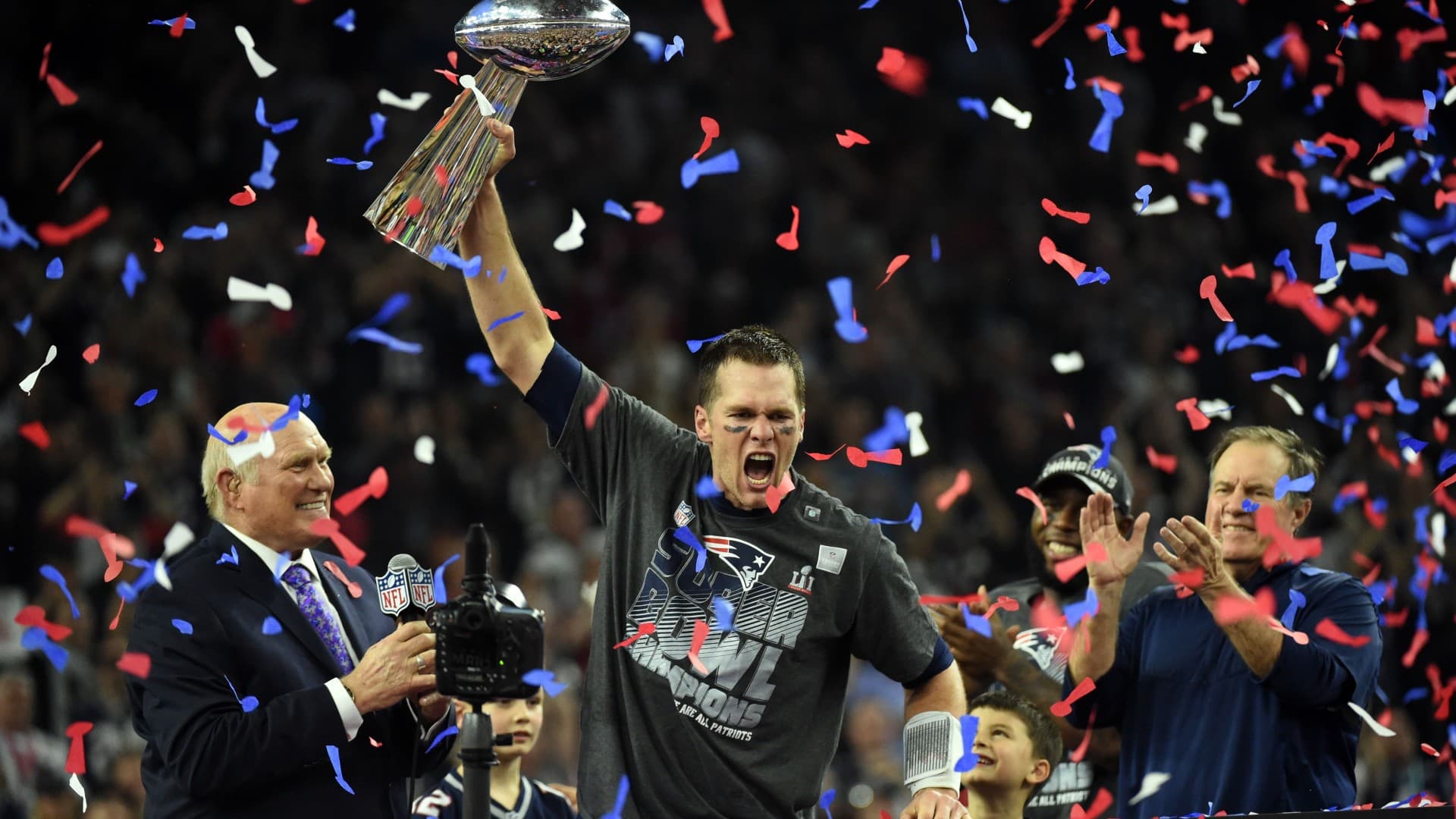 Tom Brady hoists the Lombardi Trophy after winning Super Bowl LI.