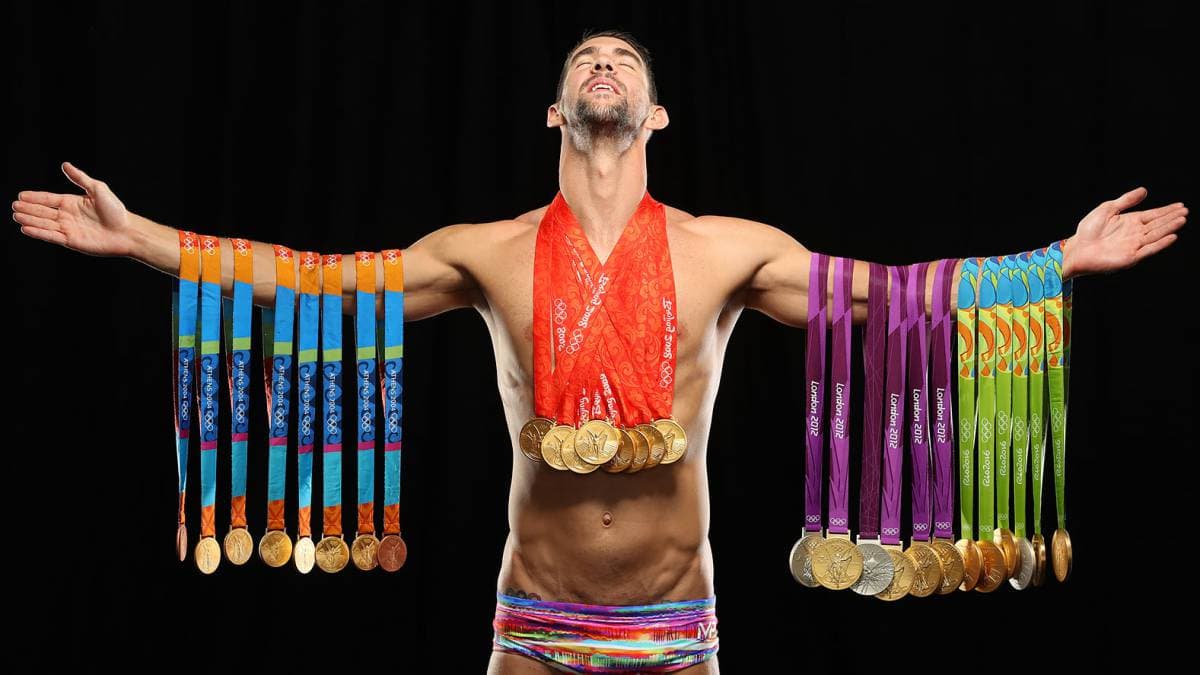 Michael Phelps sporting his 28 Olympic medals.